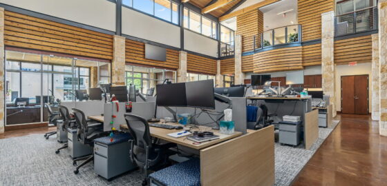 Open work space with vaulted ceiling at 6150 Sherry Lane.